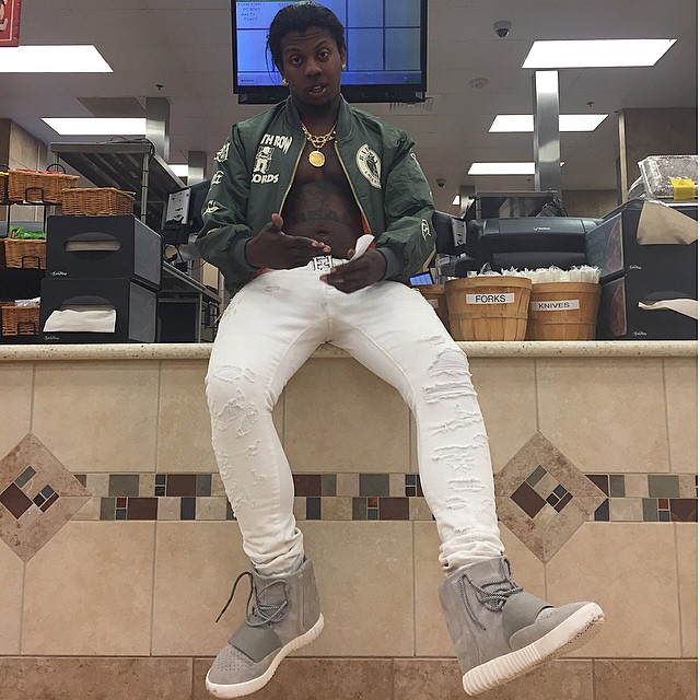 Trinidad James wearing adidas Yeezy 750 Boost