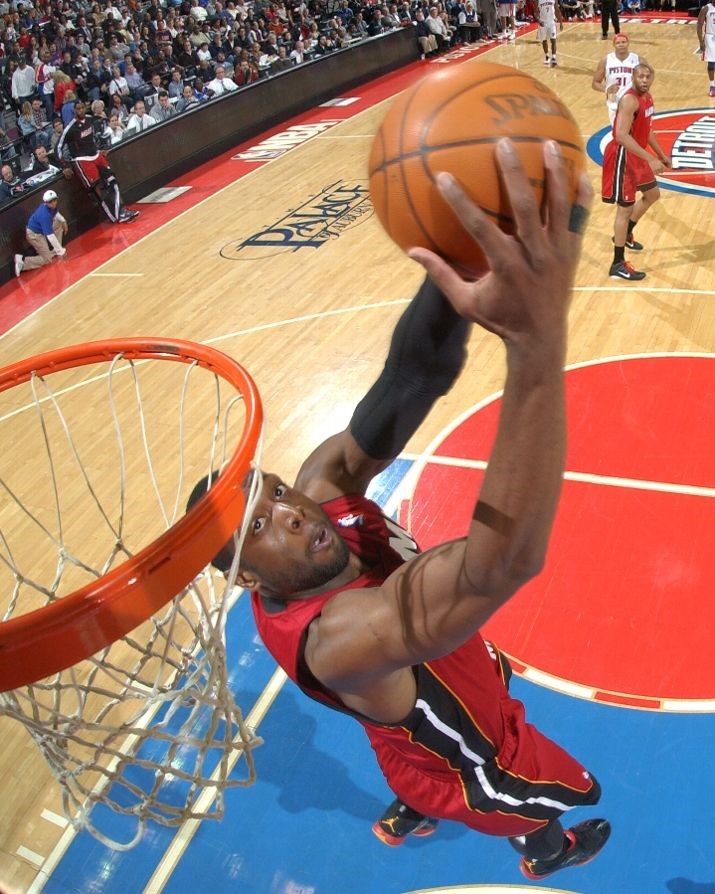 Dwyane Wade wears Black/Red/Orange Air Jordan 2011 PE against Pistons