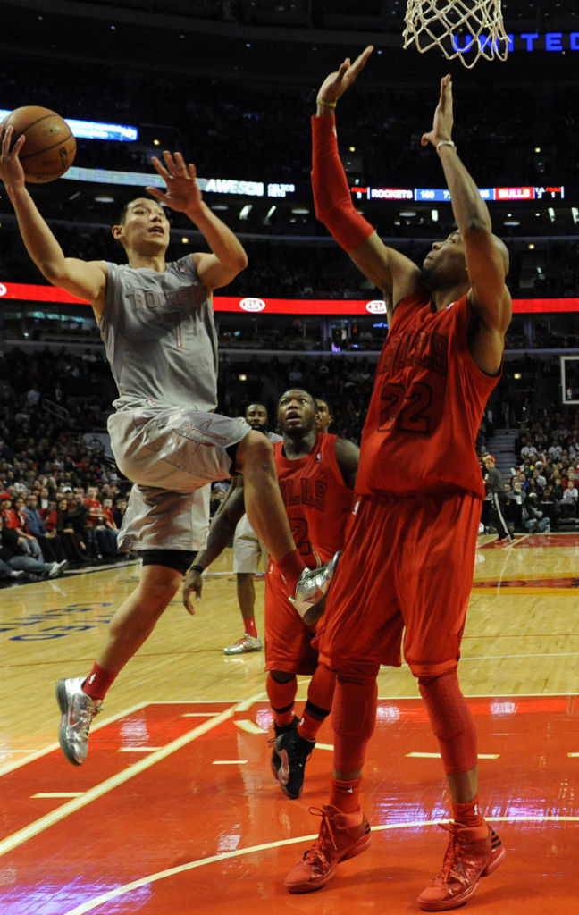 Taj Gibson wearing adidas Rose 773 Light Red Black