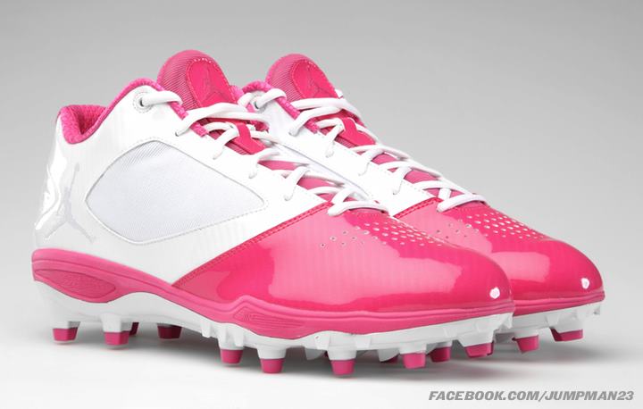 pink and white football cleats