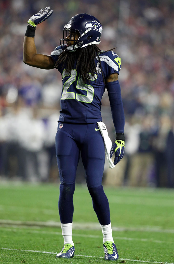 Richard Sherman wearing Nike Vapor Carbon 2014 Elite