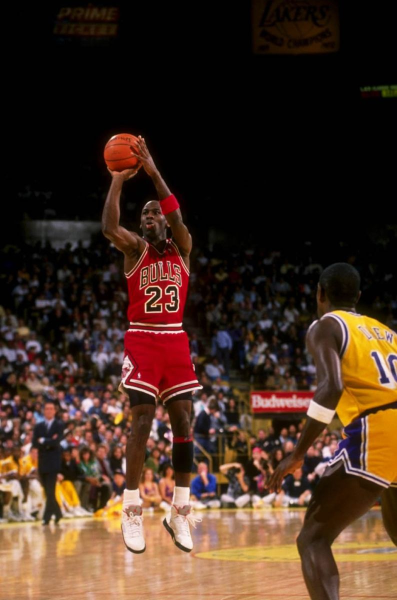 michael jordan wearing fire red 5