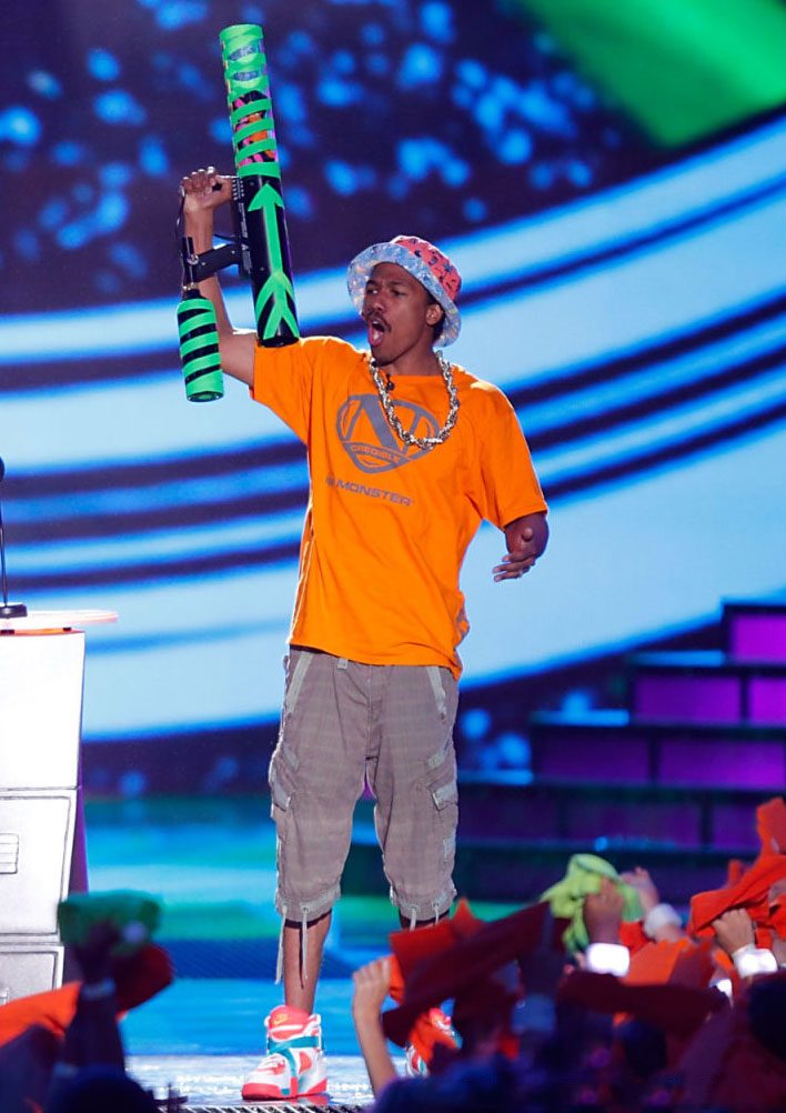 Nick Cannon wearing Nike Air Raid Atomic Mango