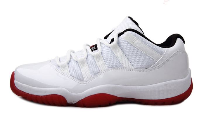 white and red low top 11s