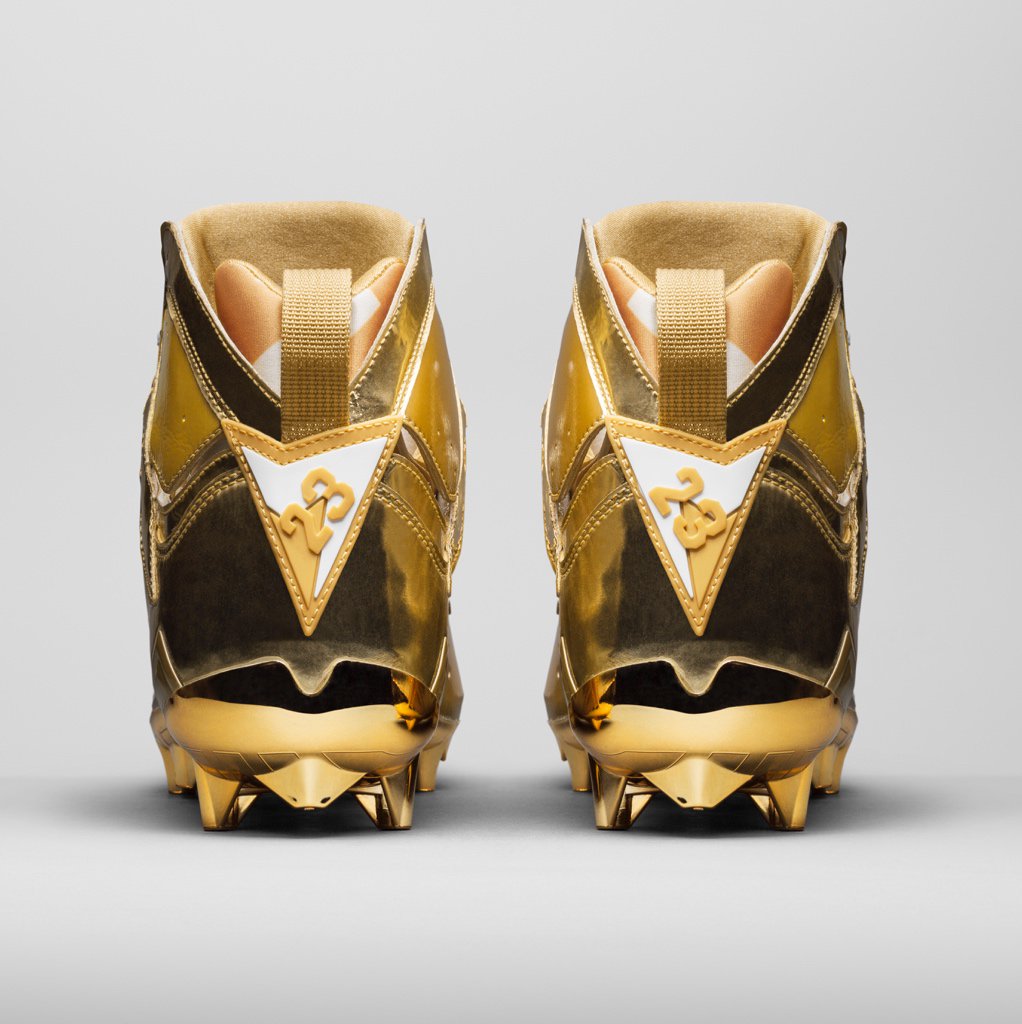 gold jordan cleats