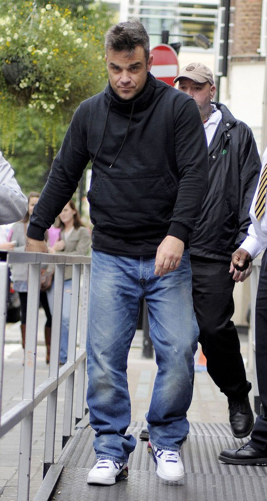 Robbie Williams Wears Nike Air 180 "Olympic" | Sole Collector