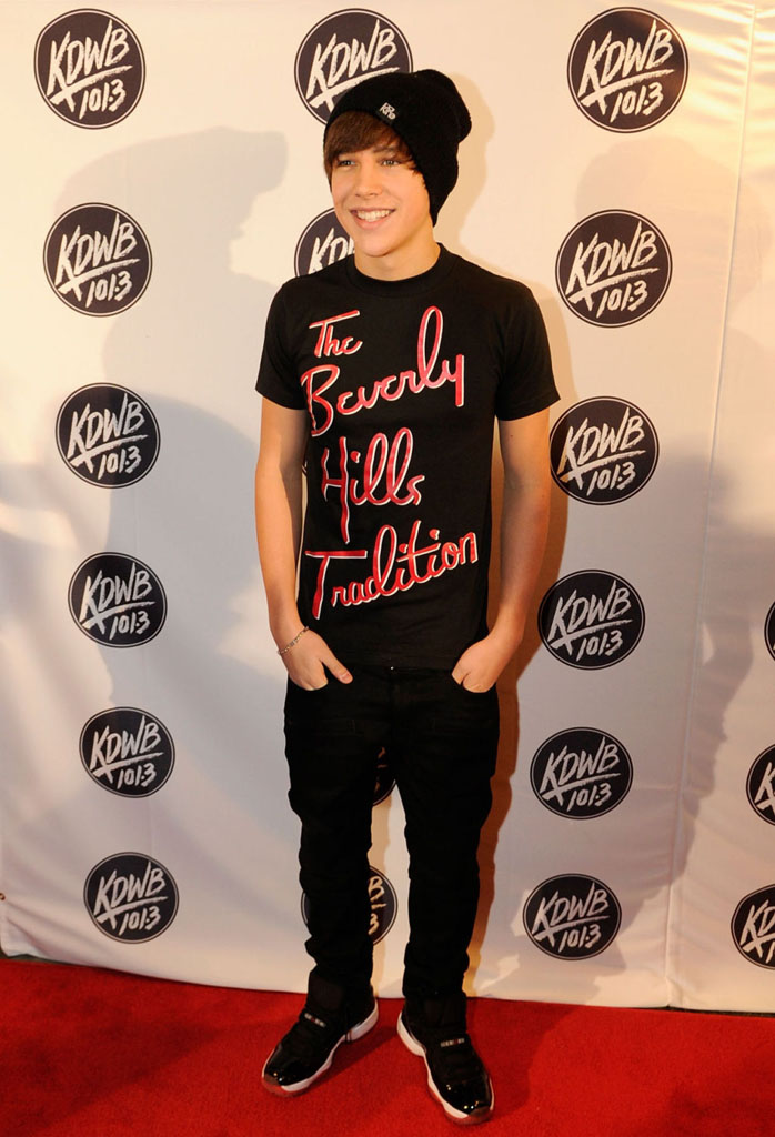 Austin Mahone wearing Air Jordan 11 Retro Black/Red