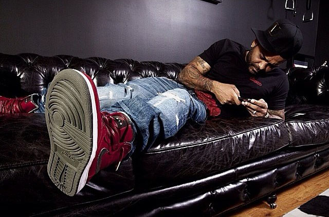 Jim Jones wearing Air Jordan I 1 Premier