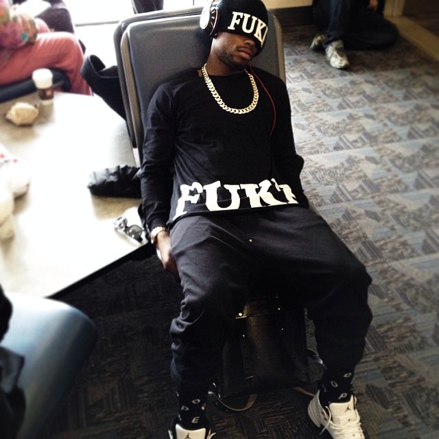 B.o.B. wearing Air Jordan 1 Taxi