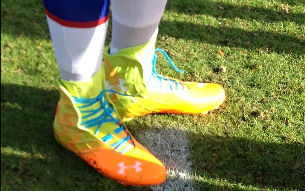 blue and yellow under armour cleats