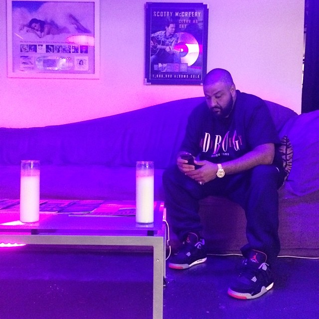 DJ Khaled wearing Air Jordan IV 4 Bred