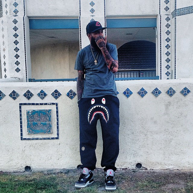 Stalley wearing Air Jordan 3 III Retro Black Cement