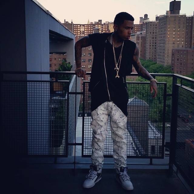 Kid Ink wearing Nike Air Python