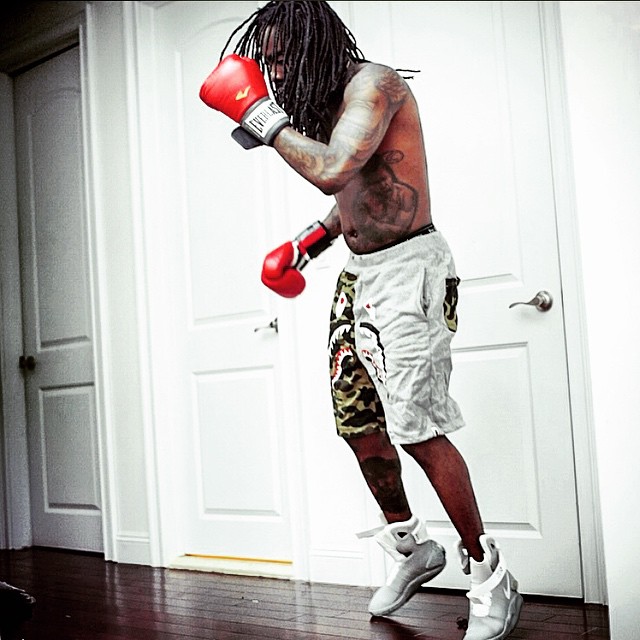 Wale wearing Nike MAG