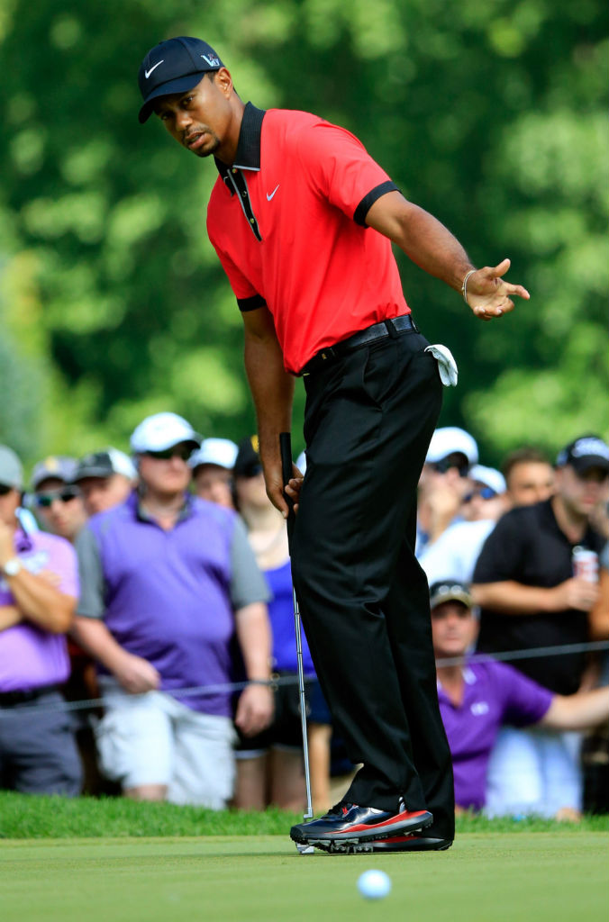 tiger woods red golf polo