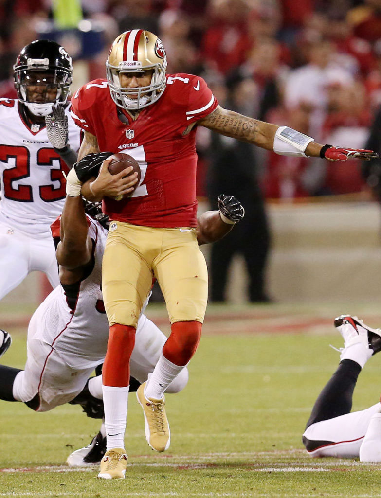 Colin Kaepernick wearing Air Jordan 12 PE Cleats (4)