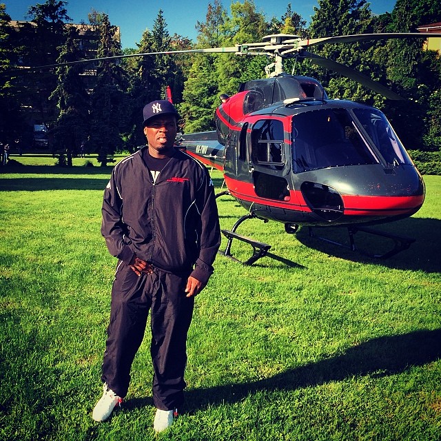 50 Cent wearing Air Jordan VI 6 White/Infrared