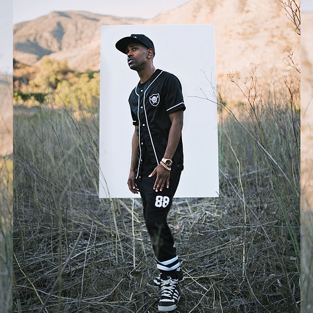 Big Sean wearing adidas Originals Rivalry Hi