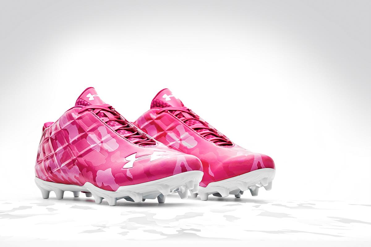 pink youth football cleats