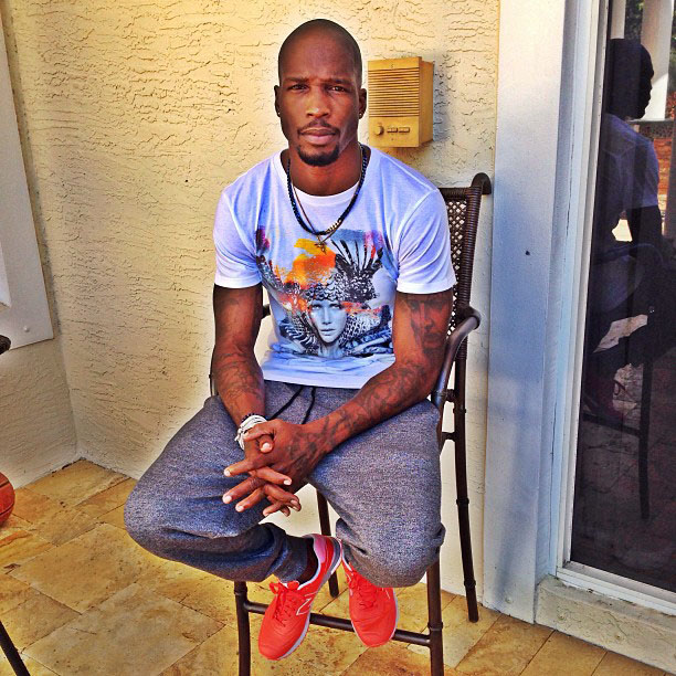 Chad Johnson wearing New Balance Revlite 574