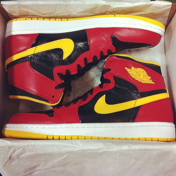 yellow and red jordan 1