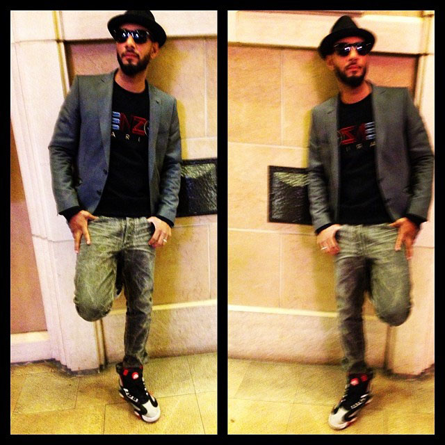 Swizz Beatz wearing Reebok Shaq Attaq Brick City