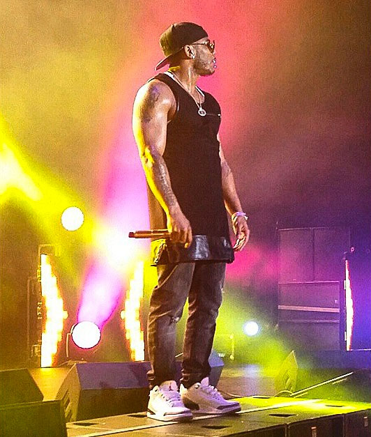 Nelly wearing Air Jordan III 3 Cement