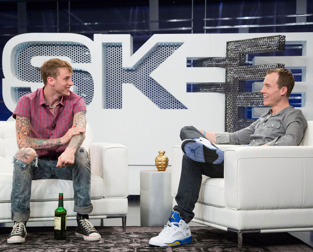 DJ Skee wearing Air Jordan 5 V Retro Laney; Machine Gun Kelly wearing Converse Chuck Taylor All Star