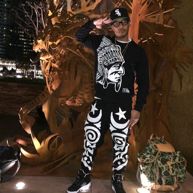 T.I. wearing Air Jordan 5 Retro Oreo