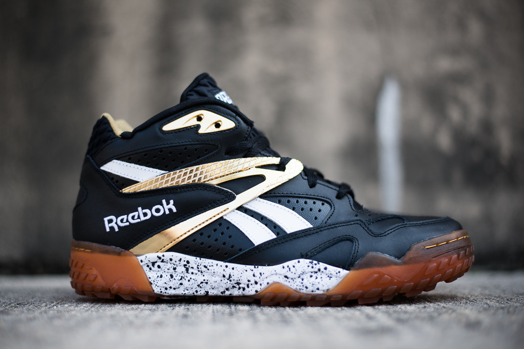 Black and best sale gold reebok classics