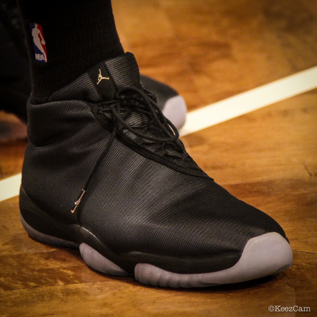 James Young wearing Air Jordan Future Black 3M