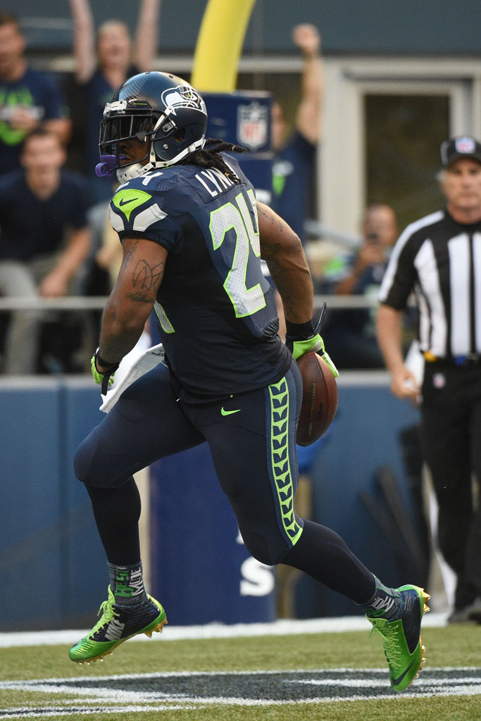 Marshawn Lynch wearing Nike Vapor Speed Mid Seahawks