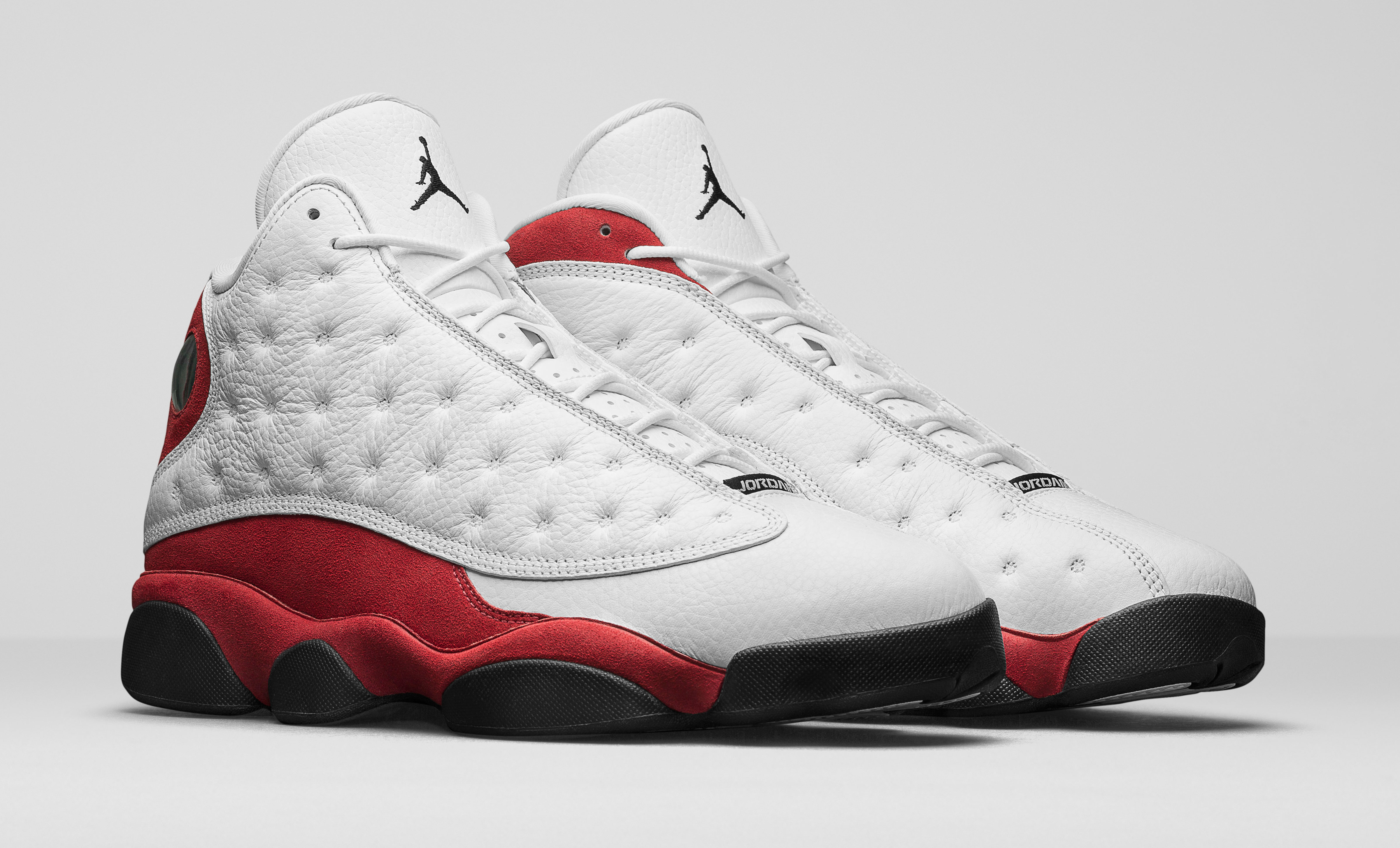 all white and red jordan 13