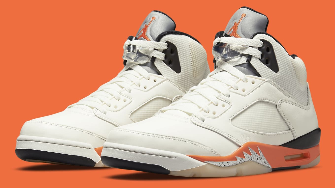 all white and orange jordans