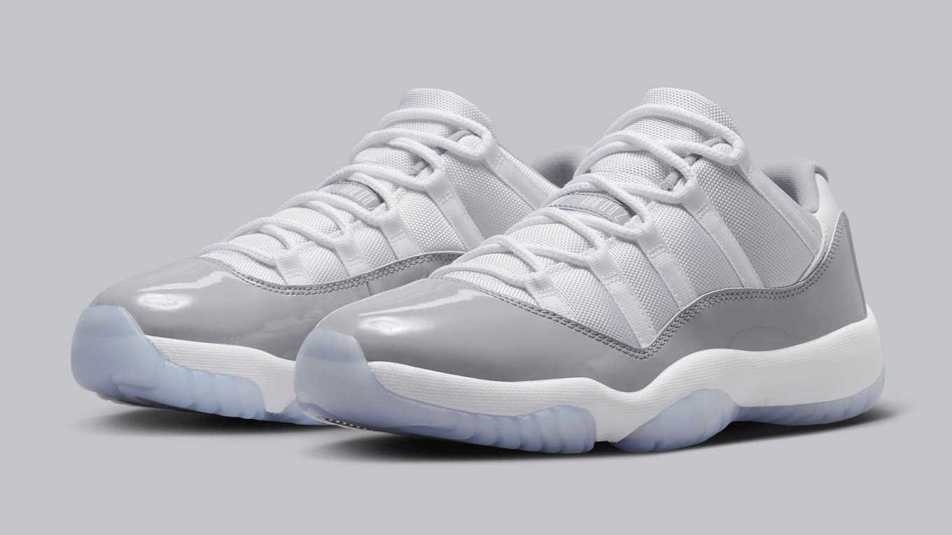 blue and white jordan 11 low