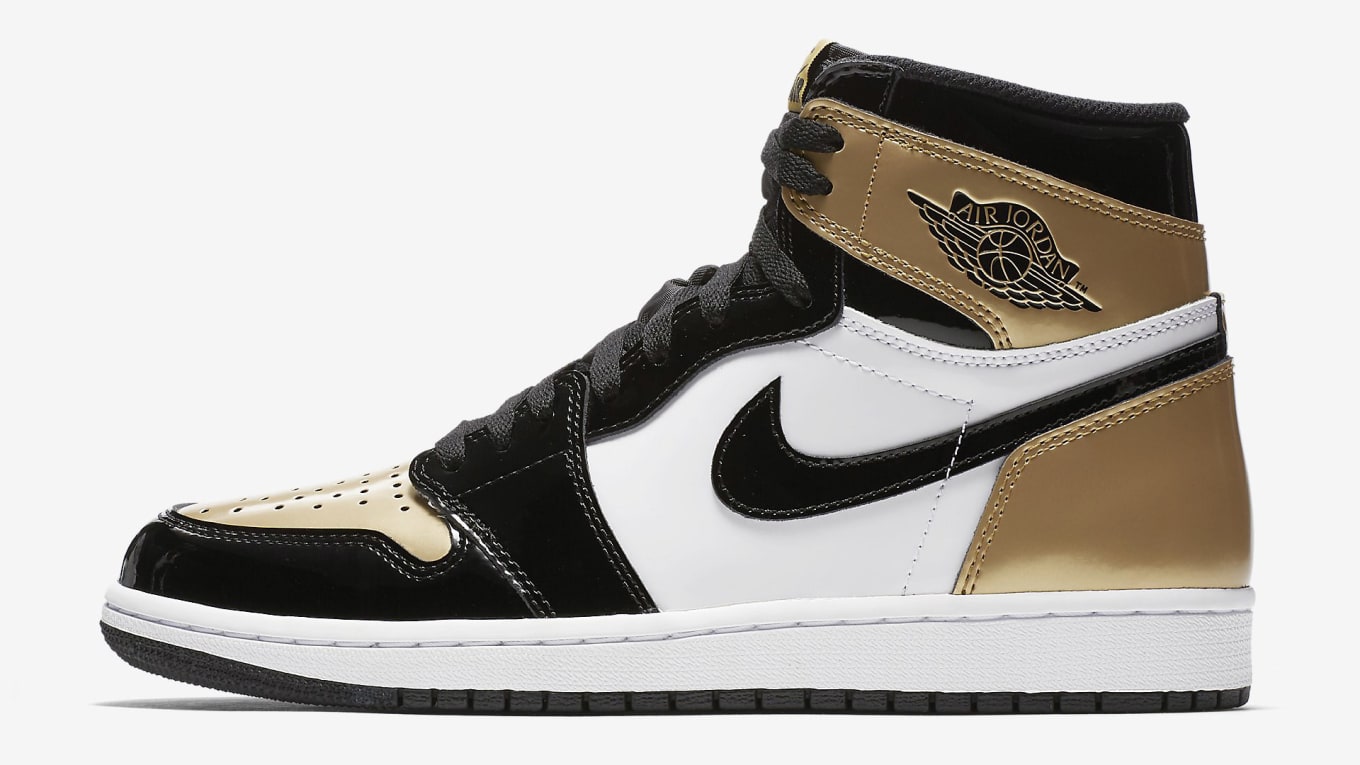 black and gold jordans champs