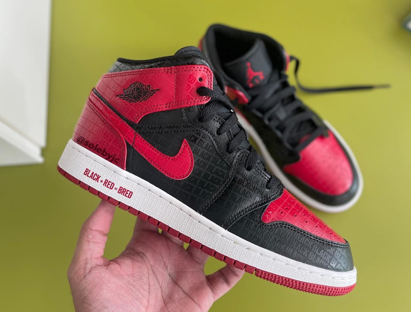 black and red jordan 1 grade school