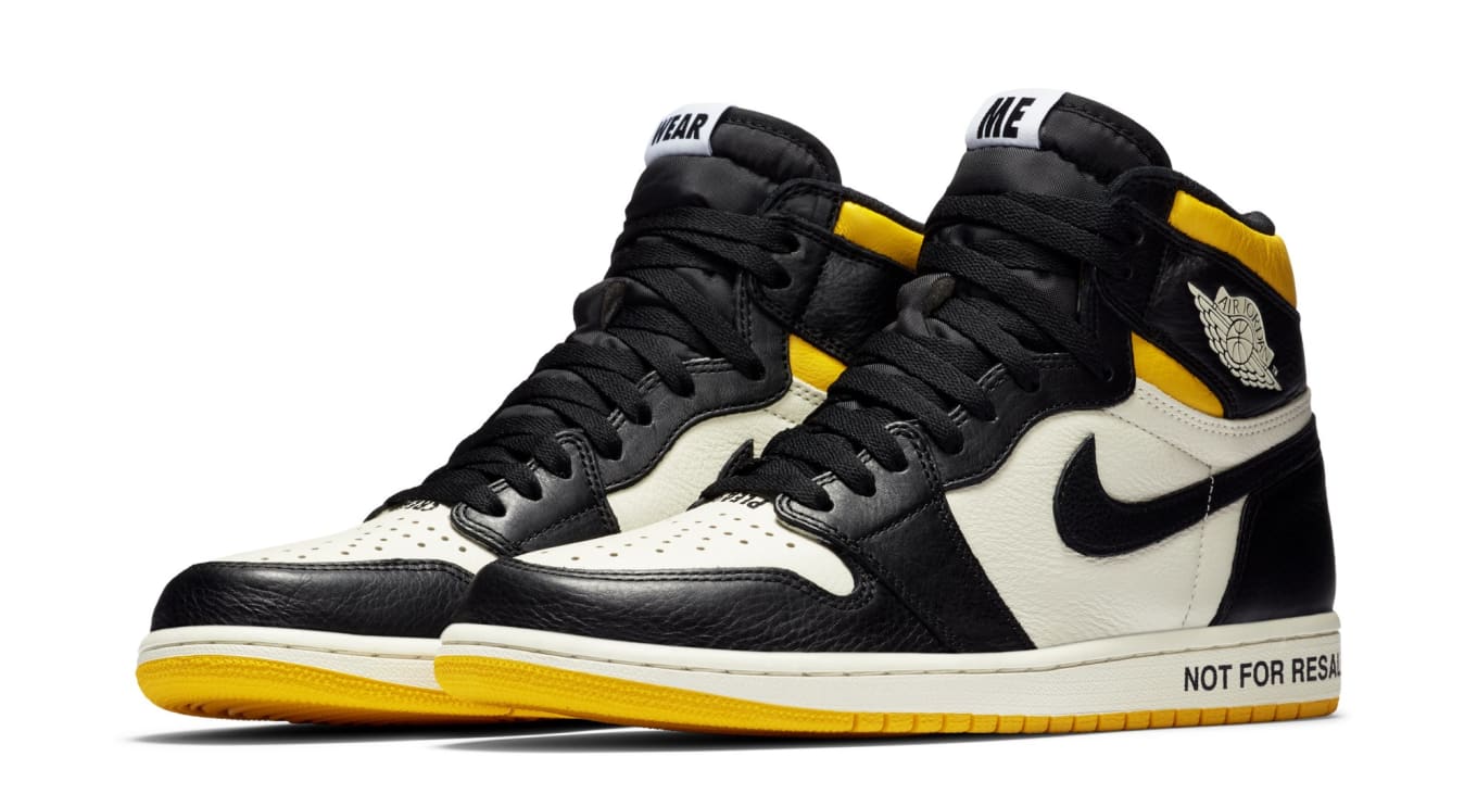 yellow white and black jordan 1s