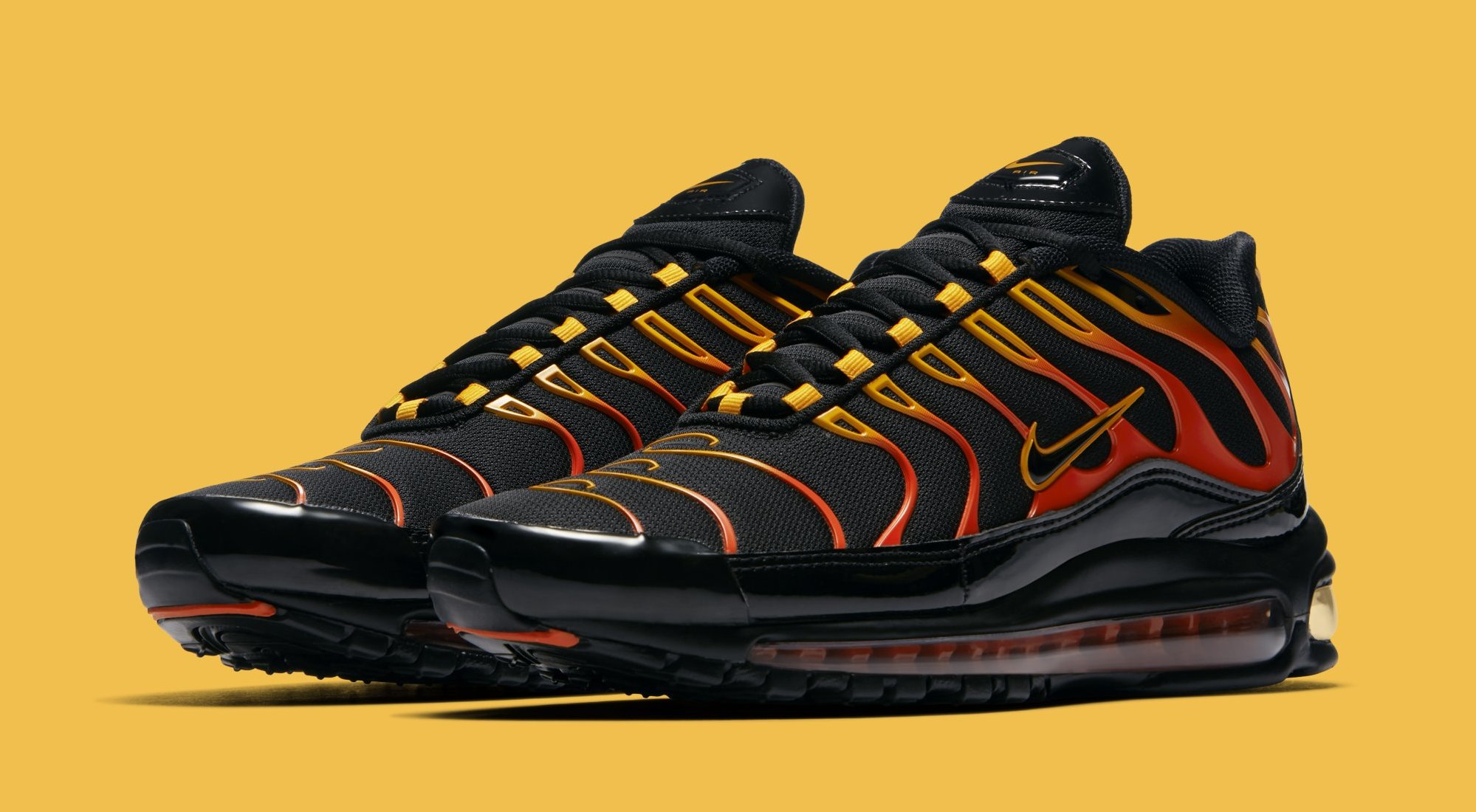 black and yellow air max 97 plus