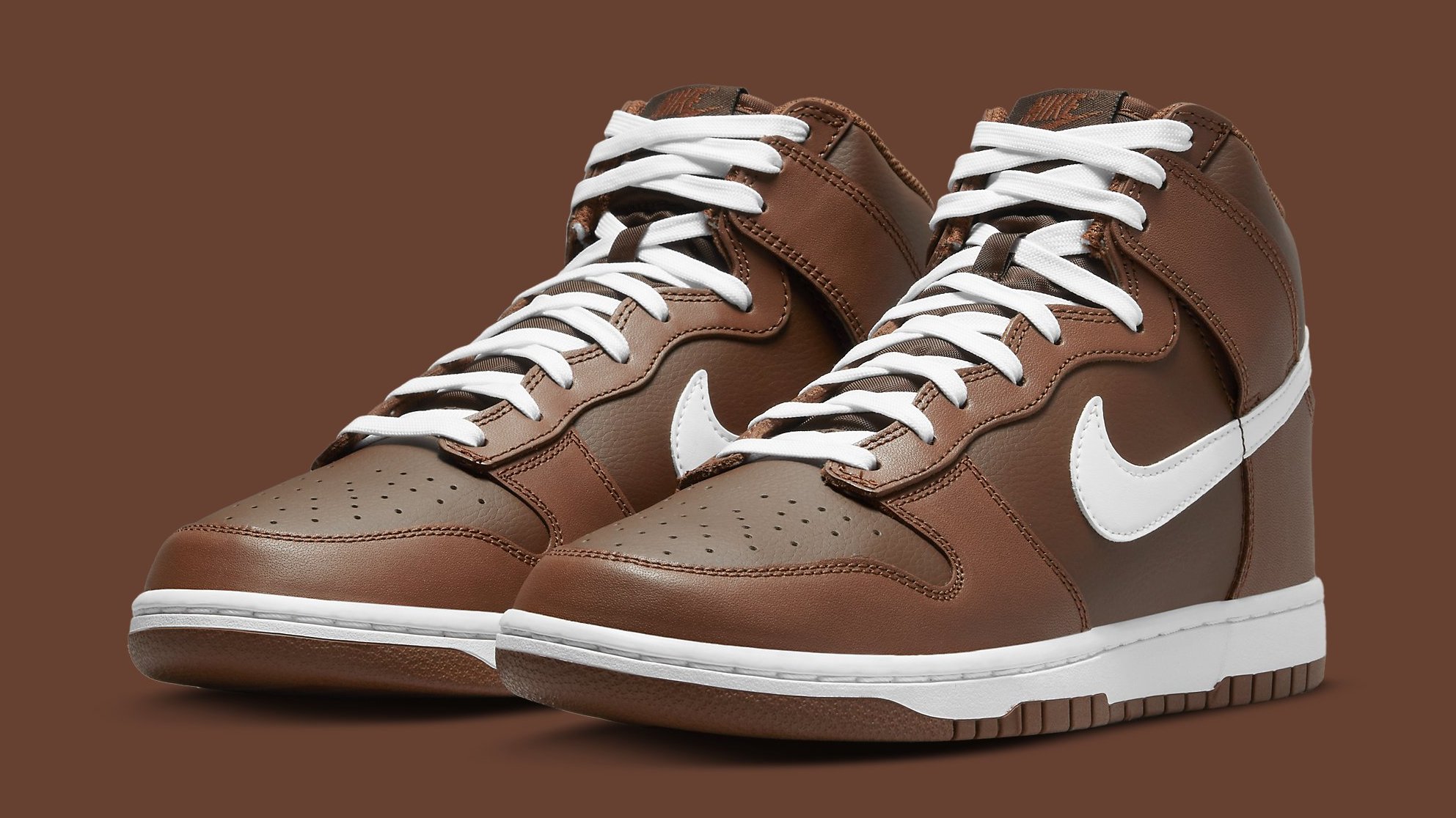 brown and white nike high tops