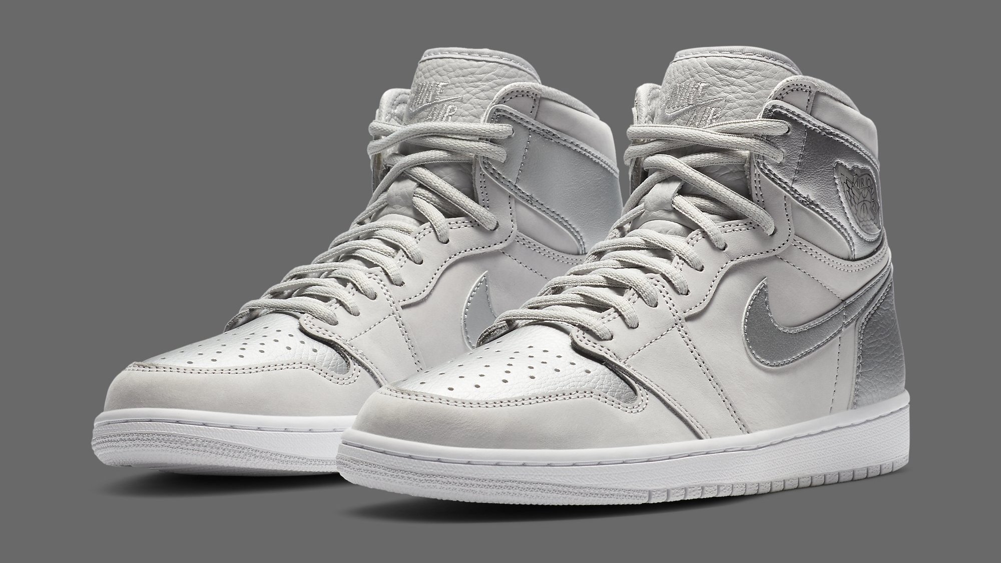 all white and silver jordans