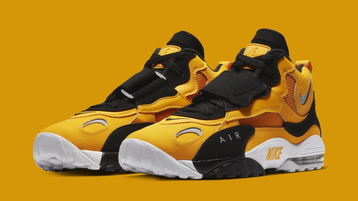 black and gold nike turfs