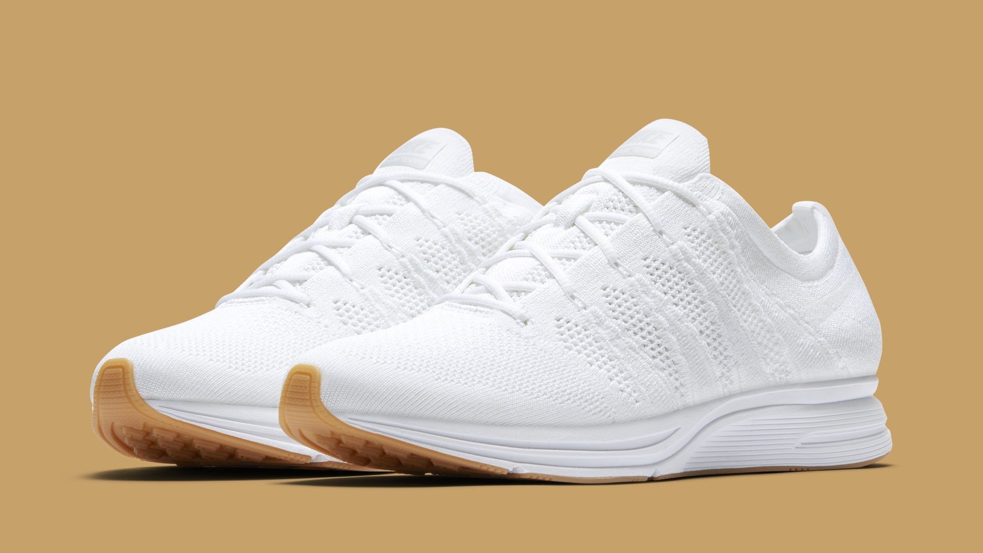 white nike shoes with gum soles