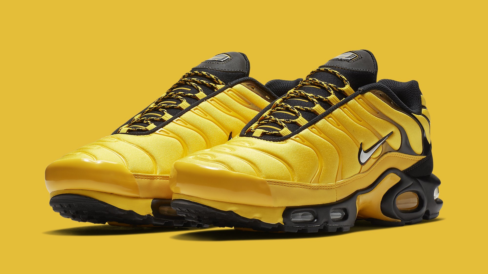 yellow and white air max plus