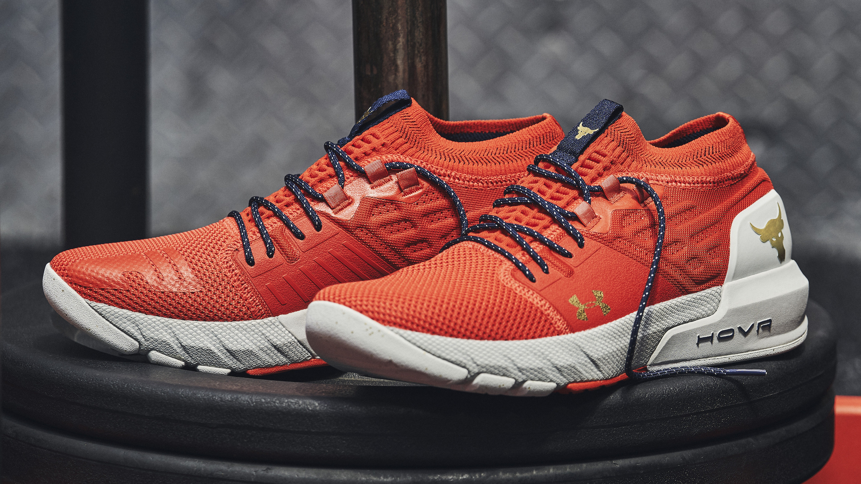 orange and grey under armour shoes