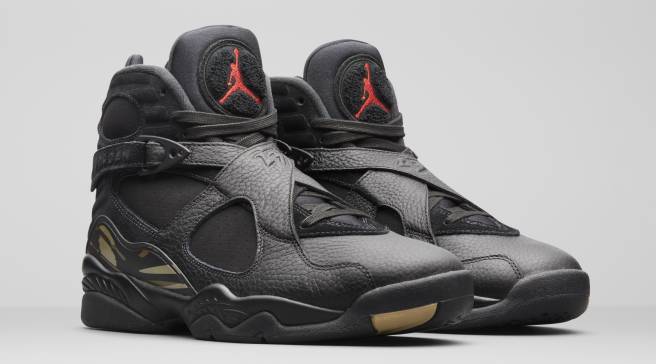 black and gold jordan 8s