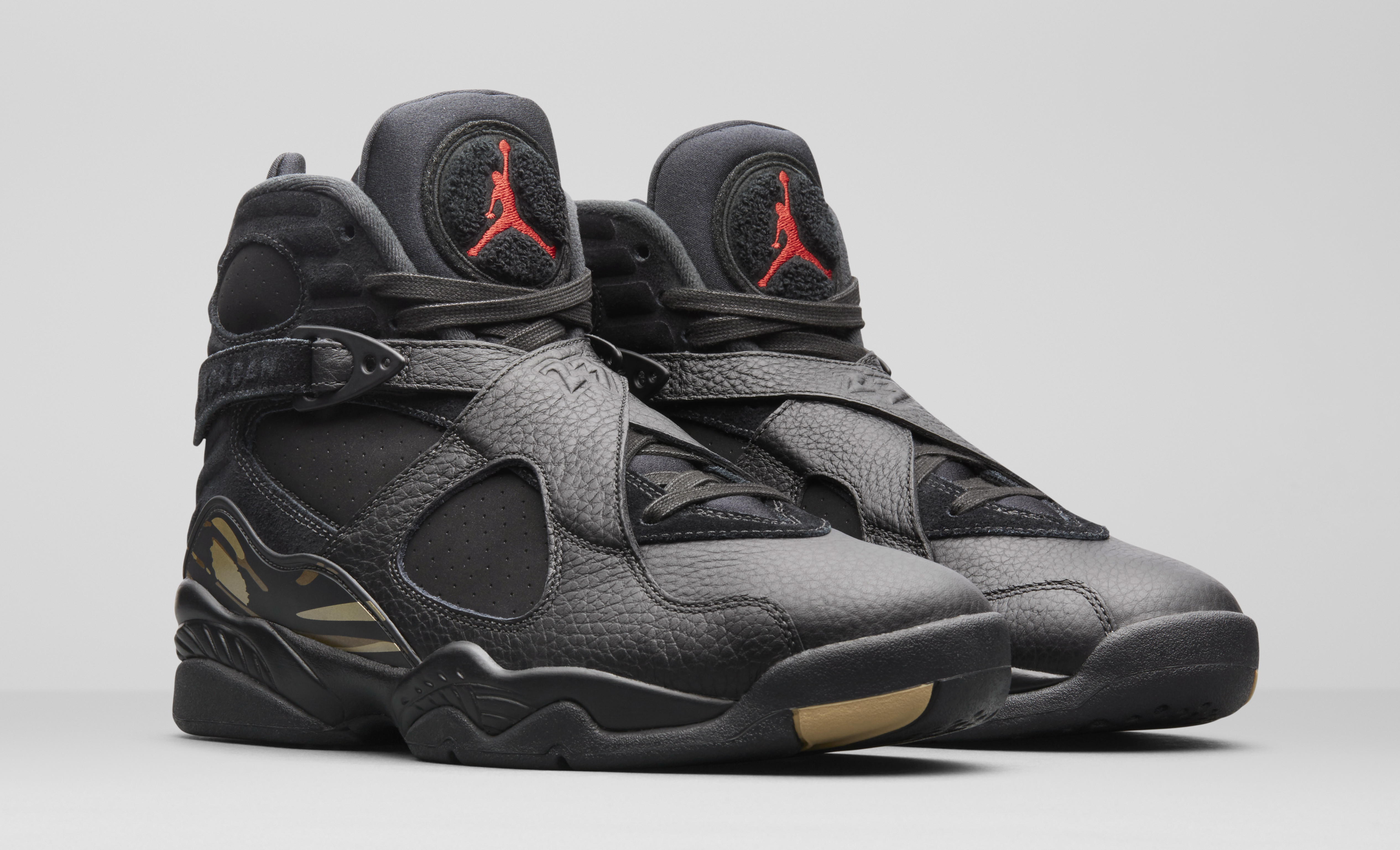 black and gold ovo jordans