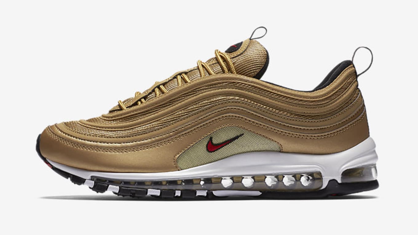 gold nike 97s