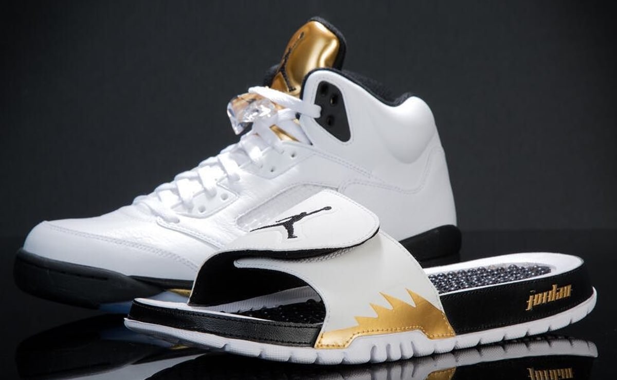 gold jordan slides