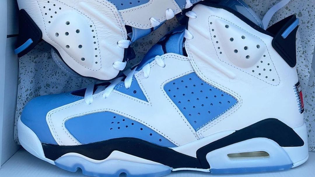 ErsA z Group l white and north carolina blue jordans